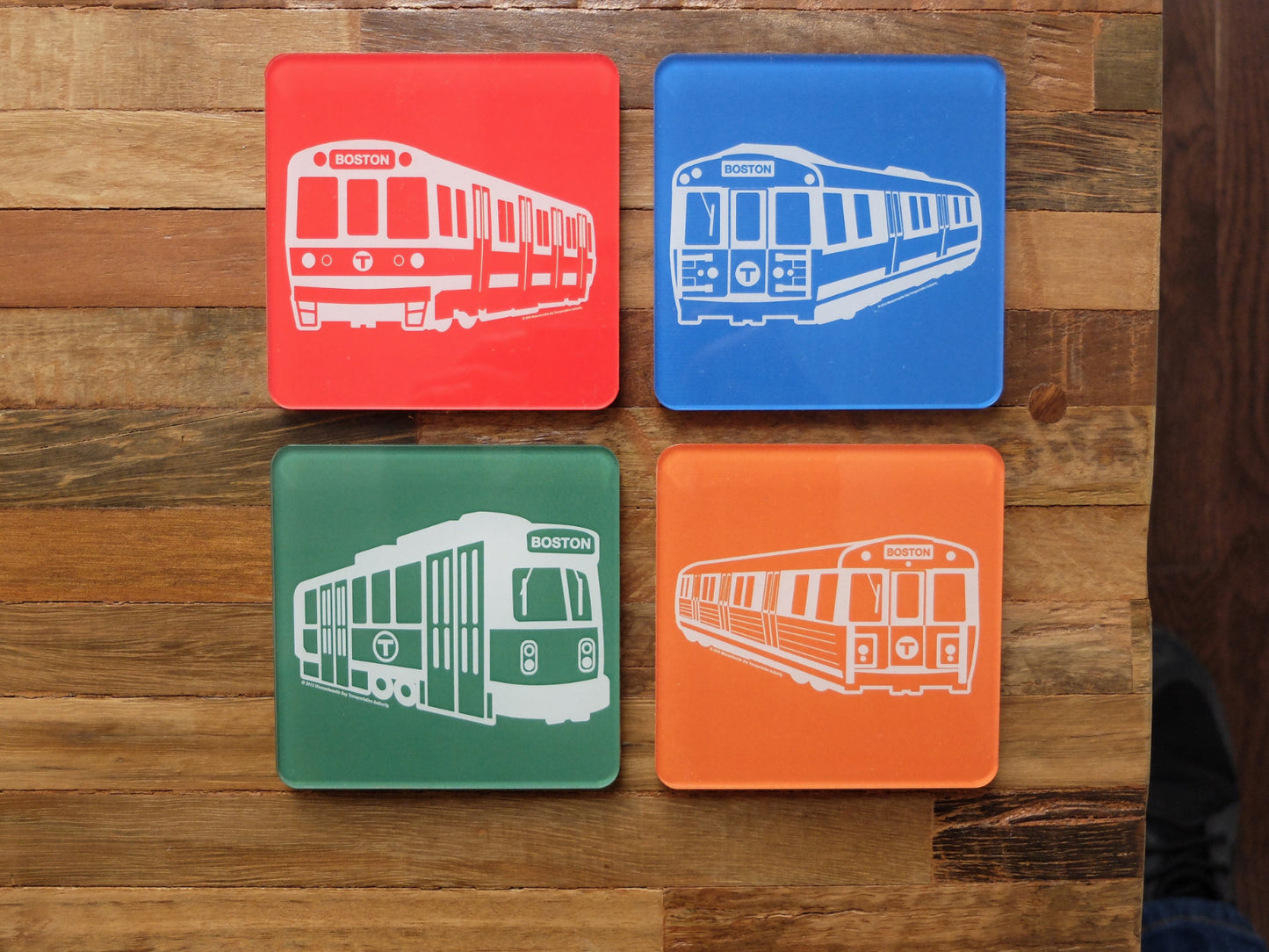 Set of Four MBTA Vehicle Coasters: Red Line Subway Car, Blue Line Subway Car, Green Line Trolley, Orange Line Subway Car